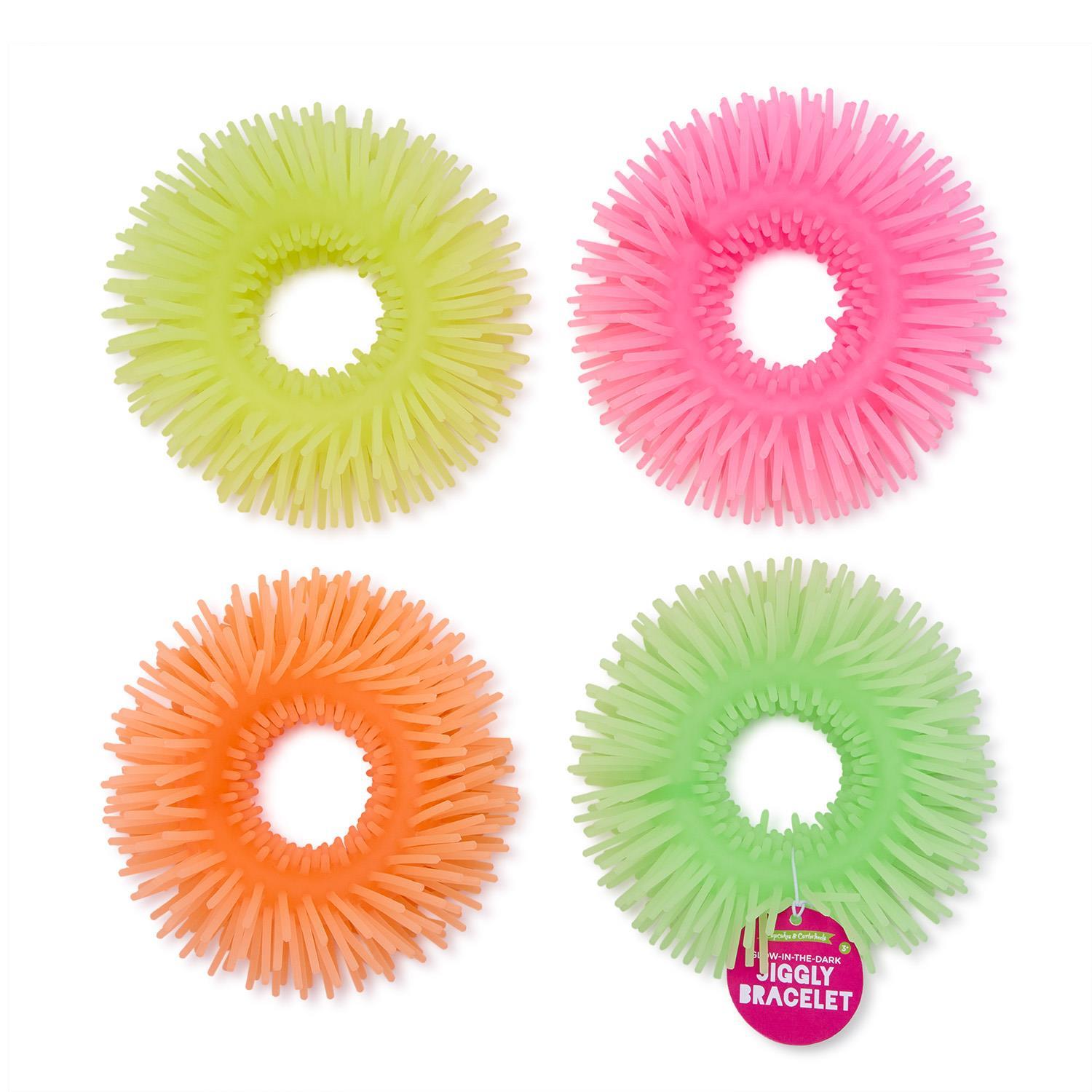 Glow in the dark Jiggly bracelet by Twos Company featuring colorful, flexible silicone design with luminous, playful appearance.