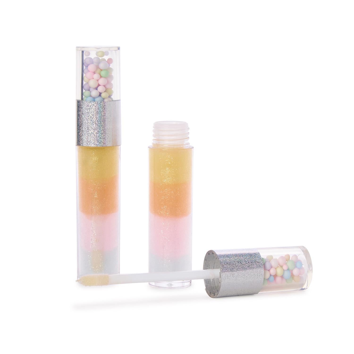 Multicolor Tutti Frutti lip gloss by Twos Company featuring shiny, vibrant shades in a sleek tube.