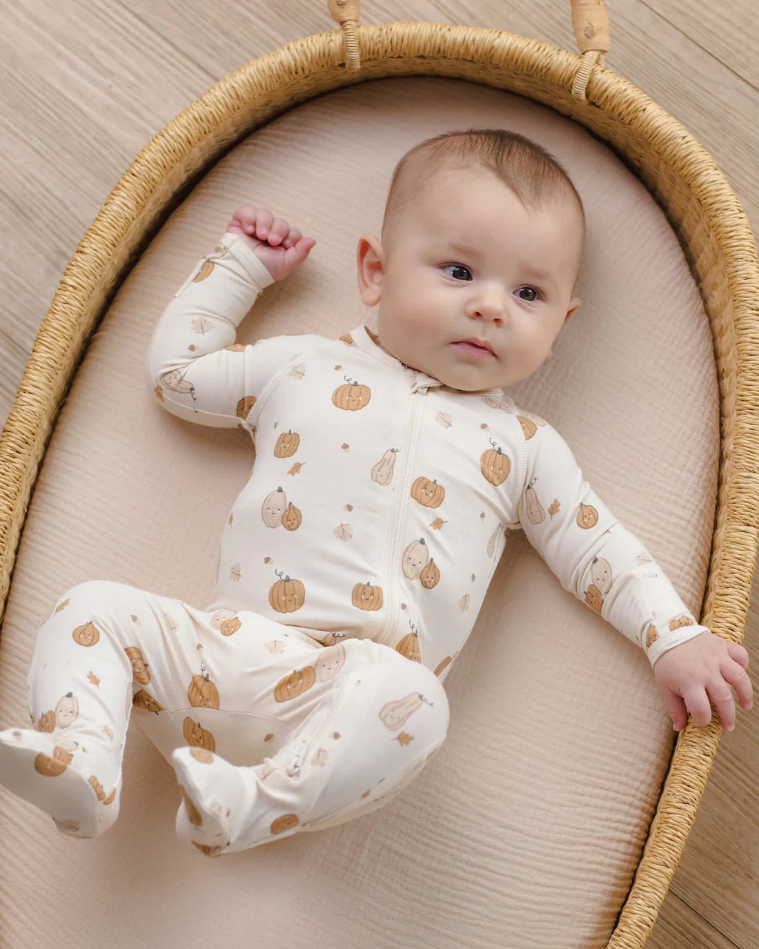 Quincy Mae Harvest Friends bamboo zip footie for babies, featuring a soft, eco-friendly fabric with playful harvest-themed designs.