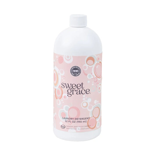 Bridgewater Candle Company Sweet Grace 32oz laundry detergent bottle with a white cap and label, positioned on a neutral background.