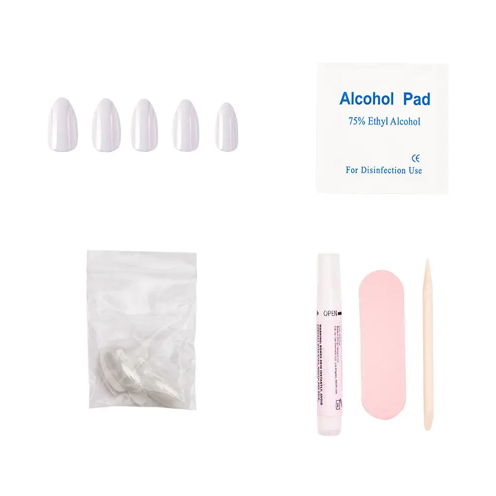 Pearlescent white Moonlight press-on nails from Glamnetic, showcasing a glossy, smooth finish on five stylish short nail tips.