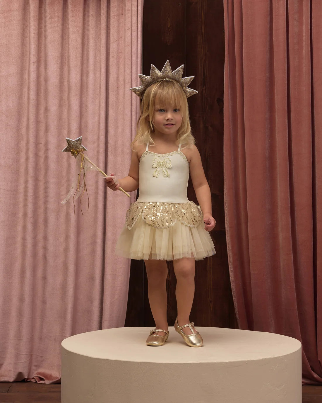 Gold sun crown and wand set from Noralee featuring a radiant sun design and matching gold accents, perfect for costumes or dress-up.