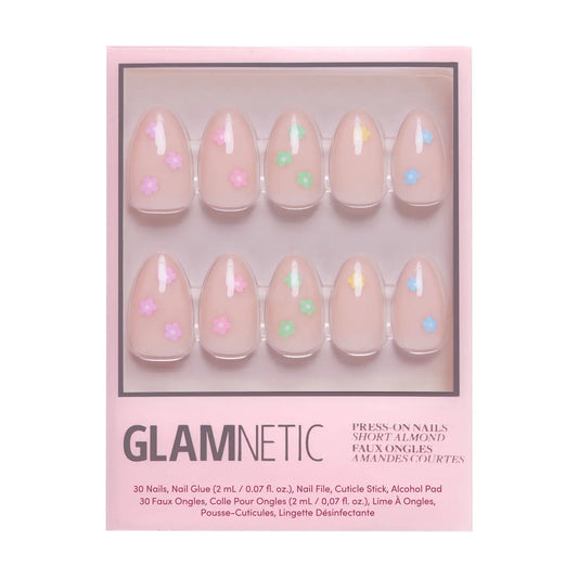 Glamnetic Full Bloom press-on nails with vibrant floral design, showcasing six beautifully decorated nail tips on a white background.