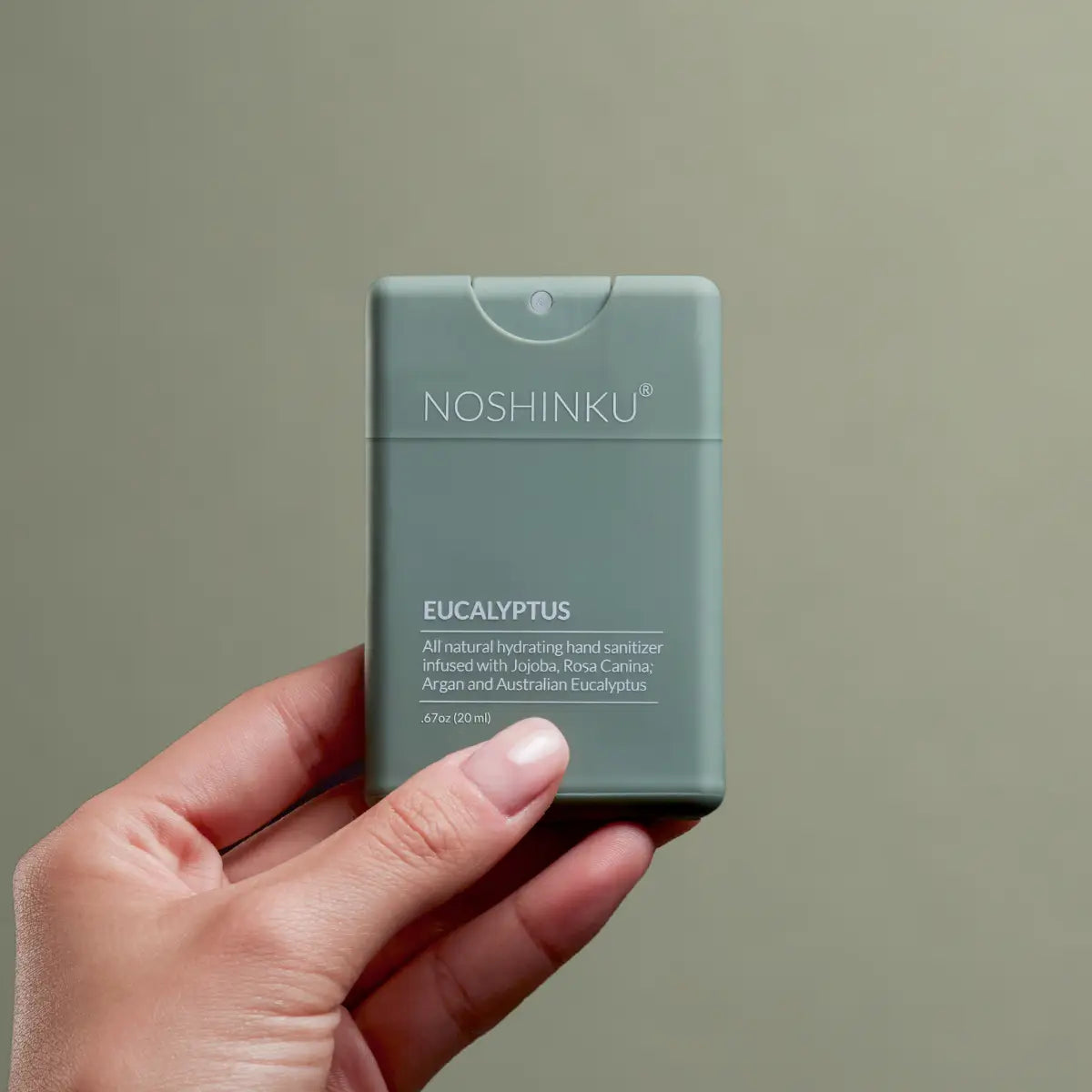 Noshinku Eucalyptus Moisturizing Pocket Hand Sanitizer bottle with pump and label, compact travel size for on-the-go hand hygiene.