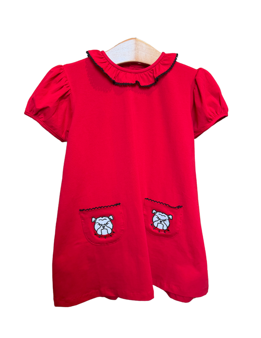 Red Bulldog Pocket Dress by Remember Nguyen featuring a vibrant red fabric with playful bulldog pocket detail.