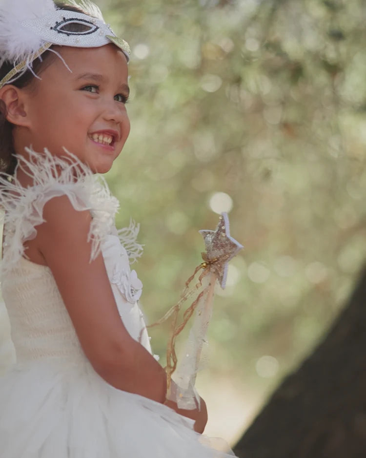White Magique dress by Noralee featuring elegant fabric and a flattering fit, shown on a model.
