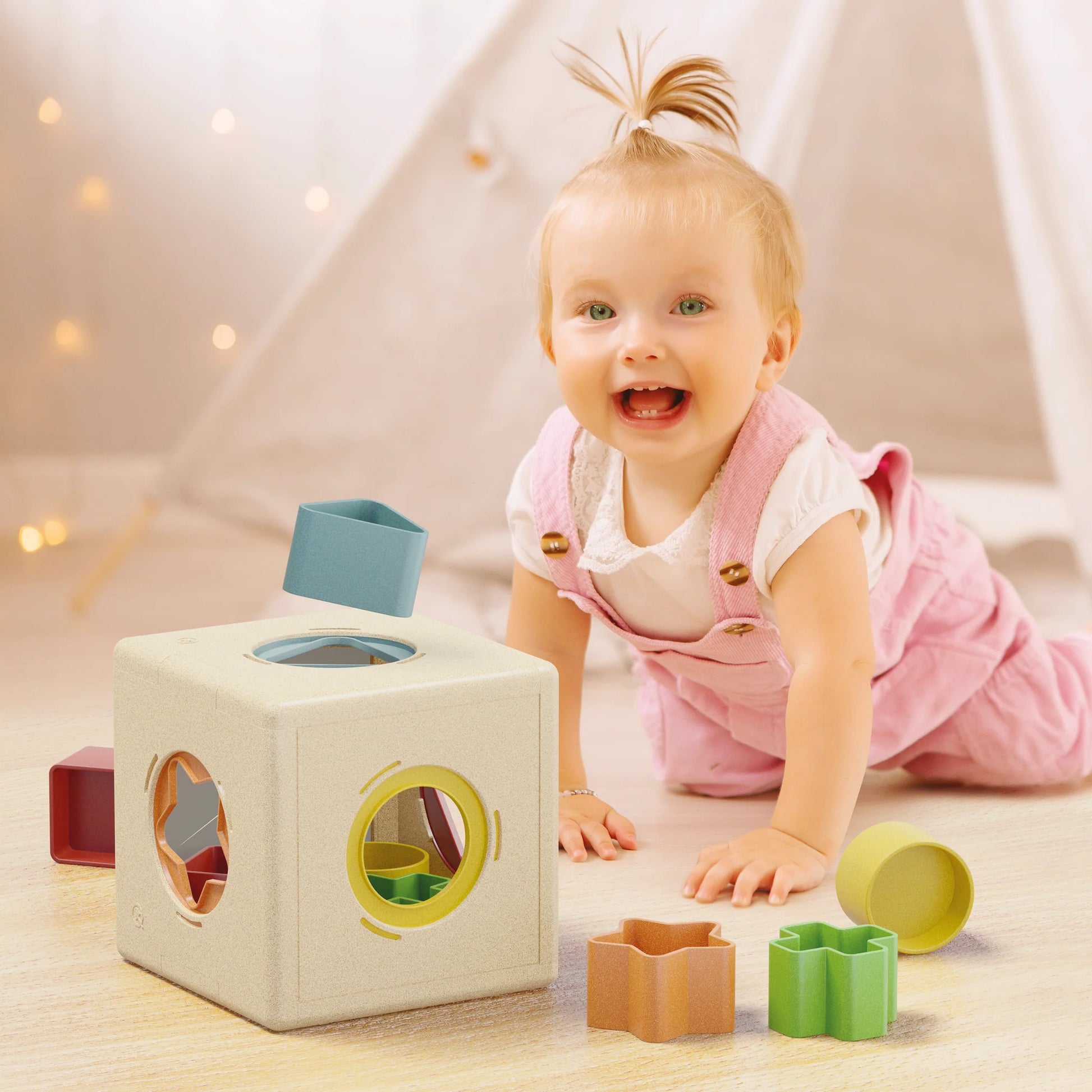 Colorful Quercetti Shape Play Box with various geometric shapes for children’s educational and creative play.
