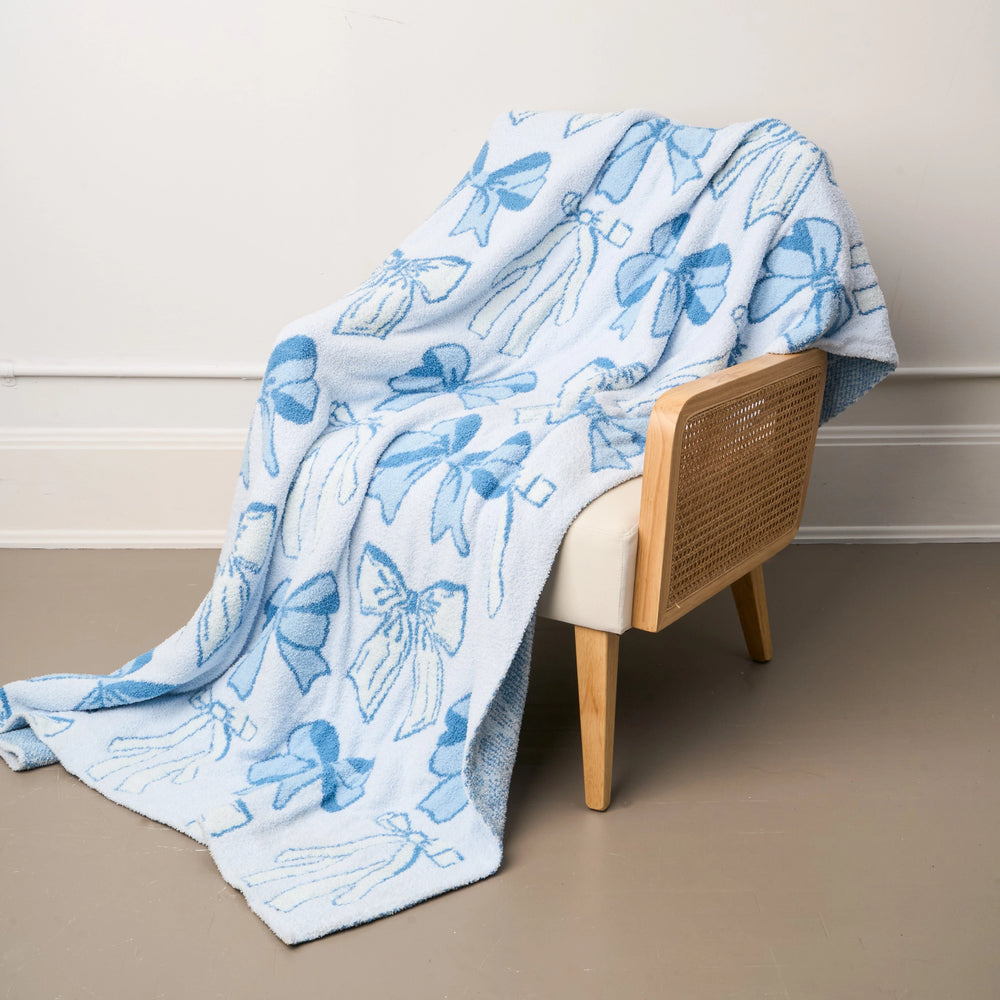 
            
                Load image into Gallery viewer, The Darling Effect - Cozy Dreams Luxe Blanket-Blushing Bows Blue
            
        