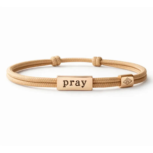 Lenny & Eva Sentiment Cord Bracelet with Pray Philippians 4:6 inscription, woven cord design and inspirational message.