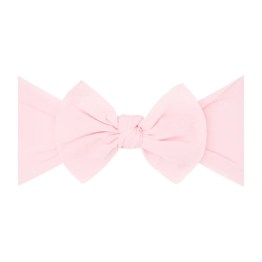 Pink Original Knot Soft Nylon Headband by Baby Bling Bows with a knotted design and stretchy nylon material.