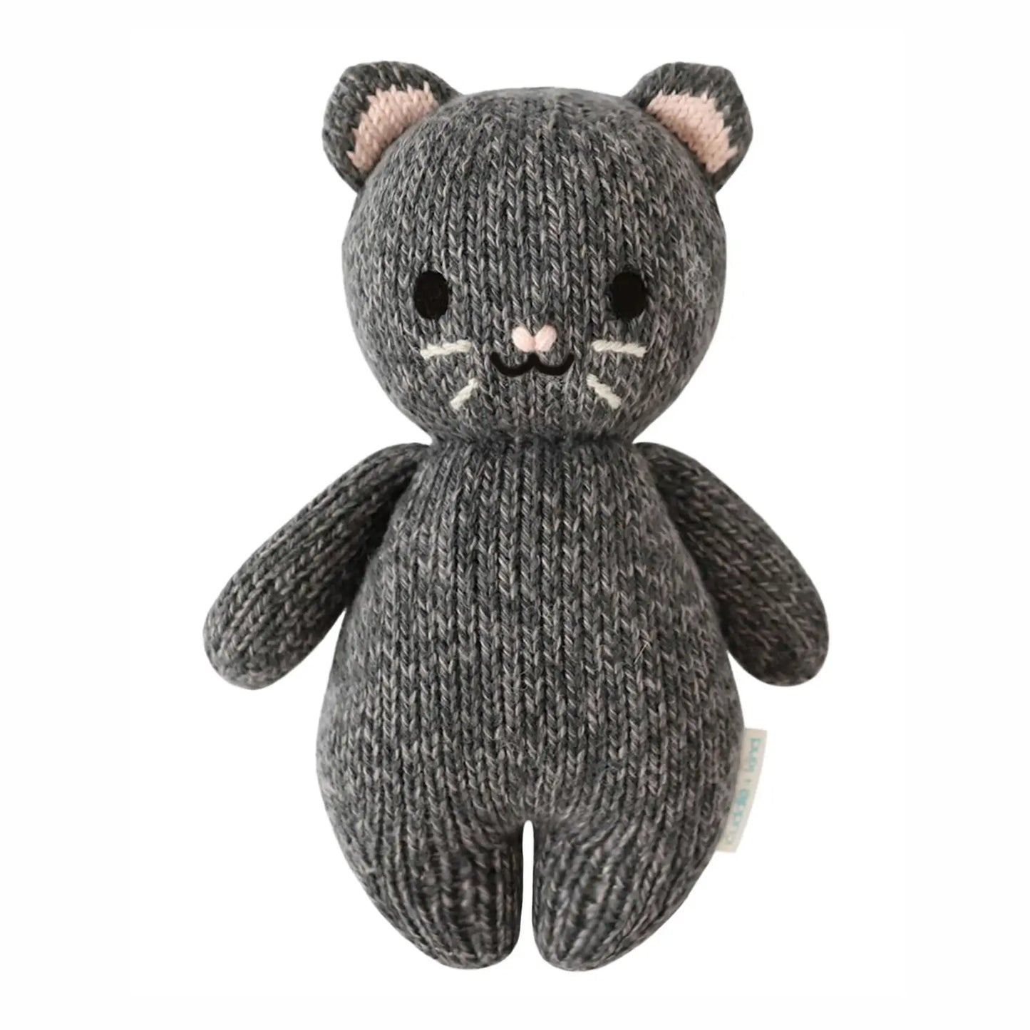 Charcoal baby kitten plush toy by cuddle + kind, soft and cuddly with detailed features, designed for gentle play and comfort.