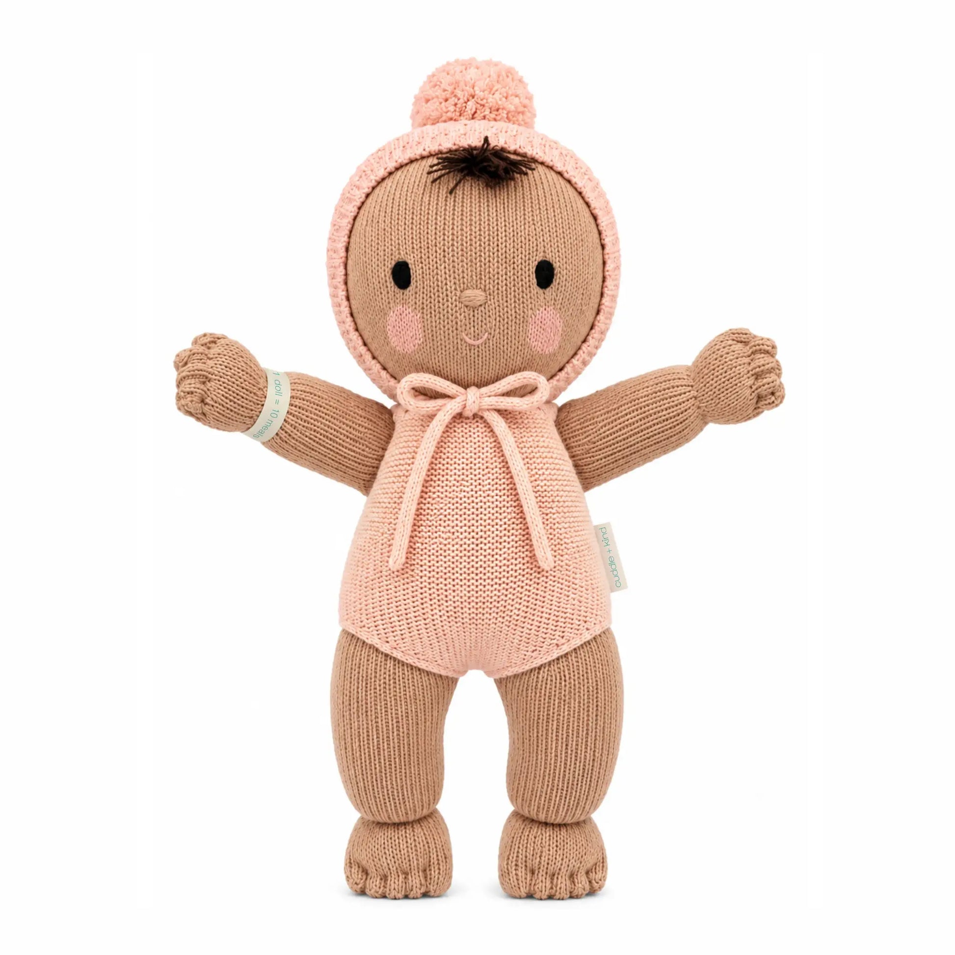 Cuddle + Kind My First Baby Peach plush toy with soft, textured fabric and embroidered facial features, designed for infants.