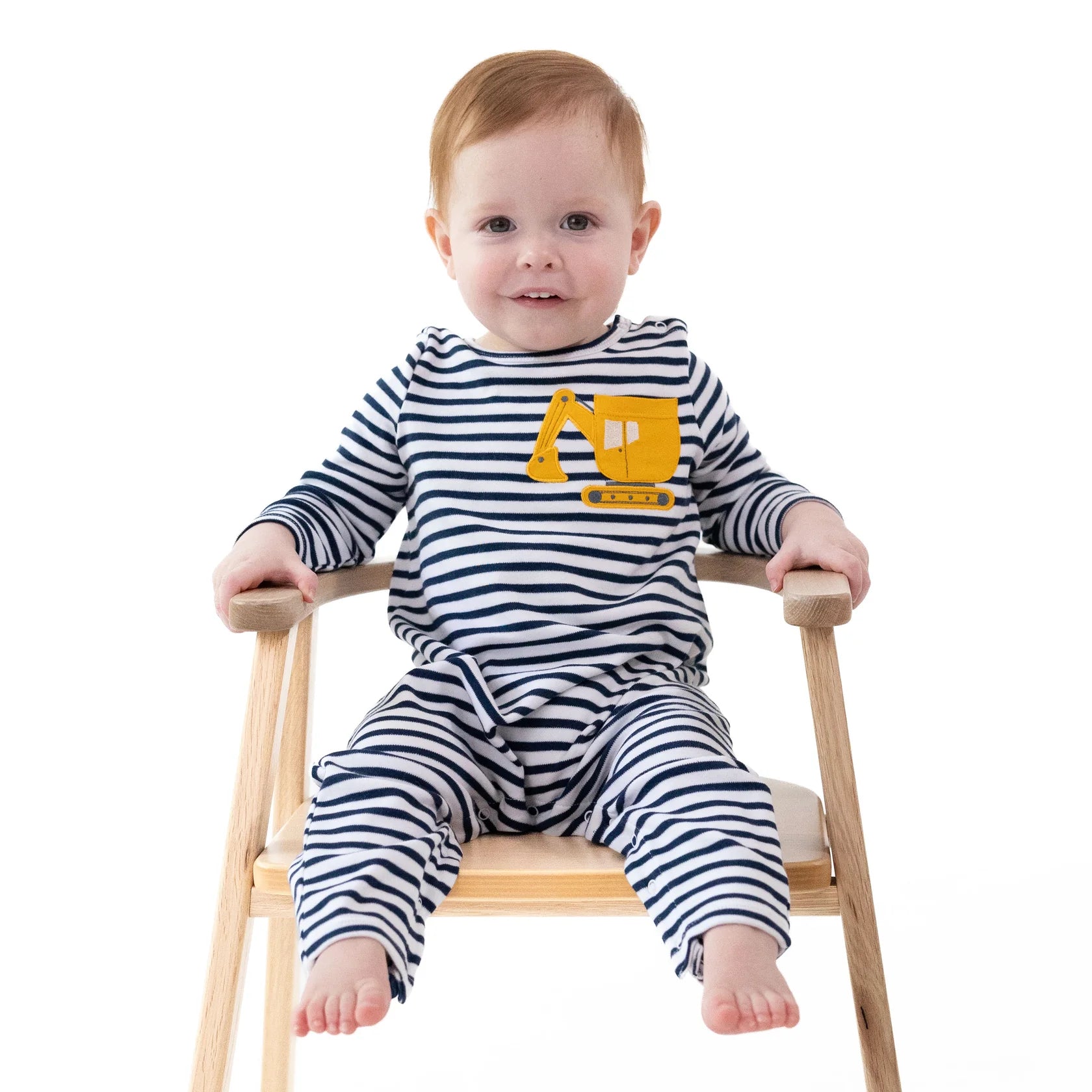 Angel Dear Digger Collection long sleeve snap shoulder romper for babies, soft fabric, and comfortable fit, shown in a lifestyle setting.