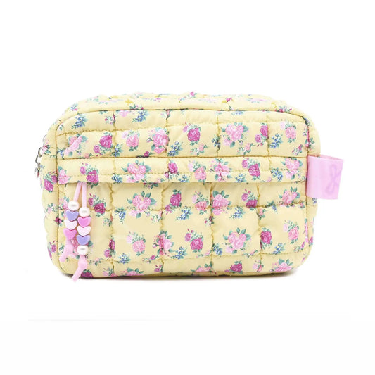 Yellow quilted scrunchies with floral print in a fabric pouch from OMG Accessories, featuring a textured quilted design.