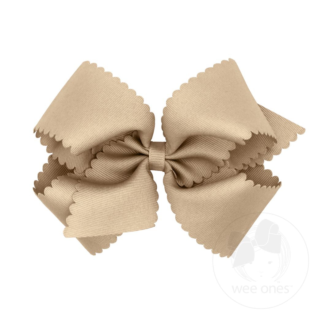 Orange grosgrain hair bow with scalloped edge by Wee Ones, perfect for little ones' hairstyles and accessories.