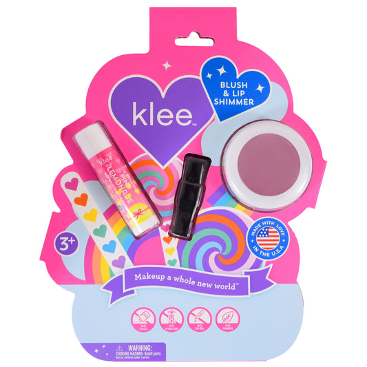 Klee Kids Rainbow Glitz blush and lip shimmer set with colorful makeup products and brushes on a white background.
