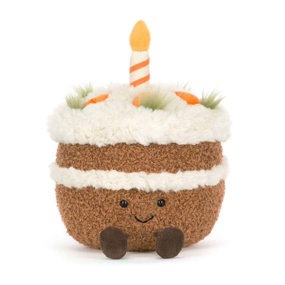 Jellycat Amuseables Carrot Cake plush toy featuring bright orange carrot cake design with green leafy accents.