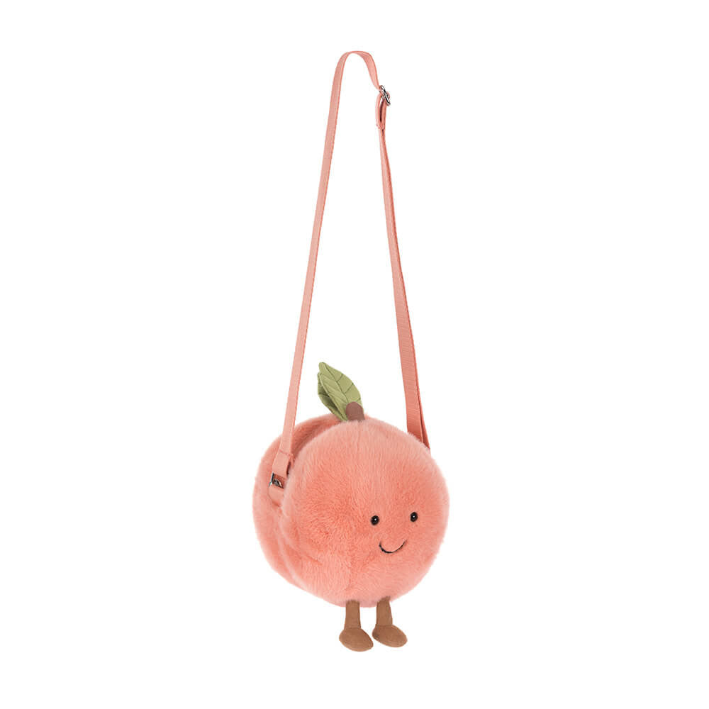 Jellycat Amuseables Peach shoulder bag featuring a soft, plush peach design with a strap for easy carrying.