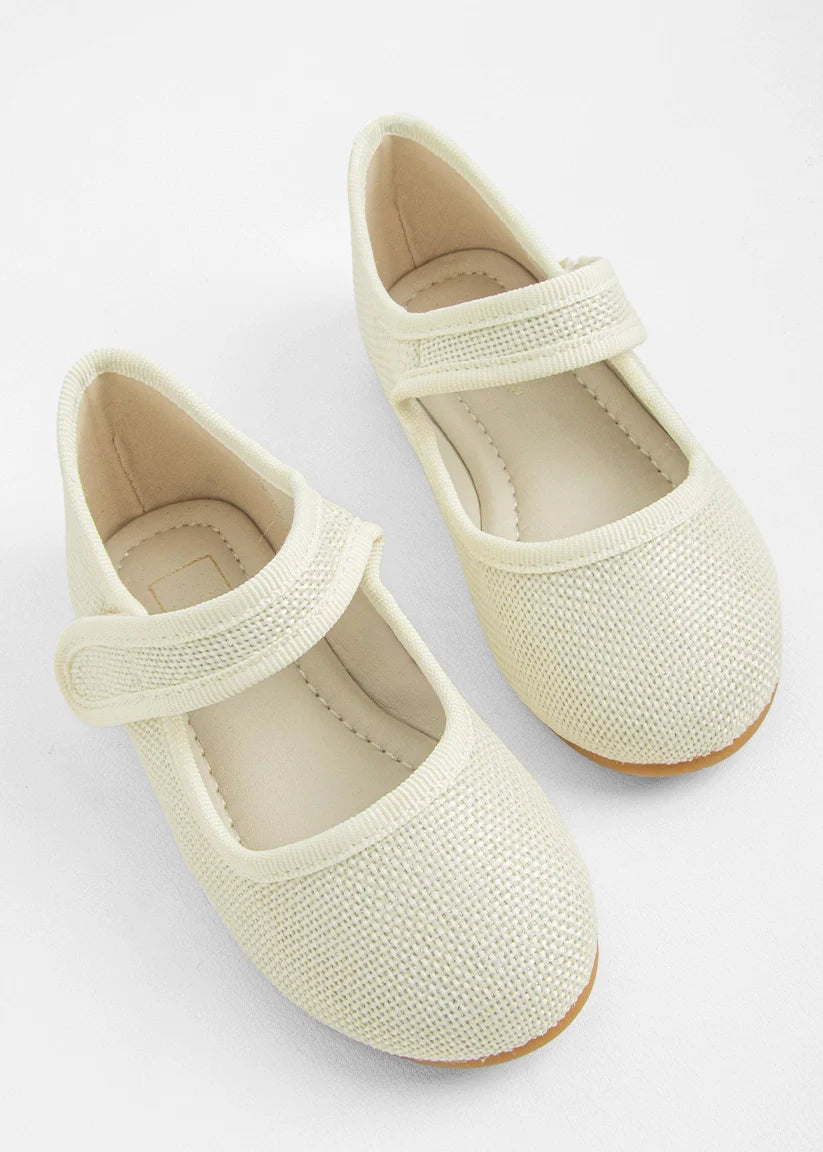 Beige Arya Mini by Shushop, small stylish handbag with sleek design and top handle, shown from front view.