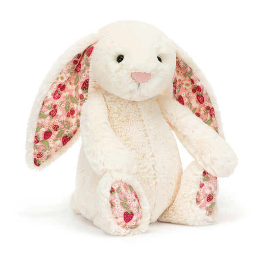 Cream-colored Blossom Bunny "Berry" plush toy by Jellycat with soft, cuddly fur and adorable bunny features.