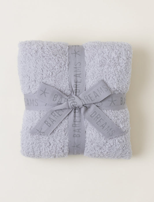 Barefoot Dreams CozyChic stroller blanket in Oyster, soft and plush for baby comfort, shown draped over a stroller.
