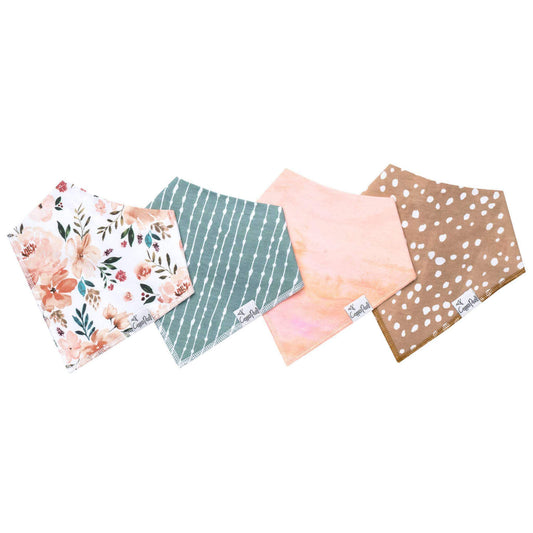 Baby wearing Copper Pearl autumn-themed baby bandana bib with fall leaf patterns and adjustable snaps.
