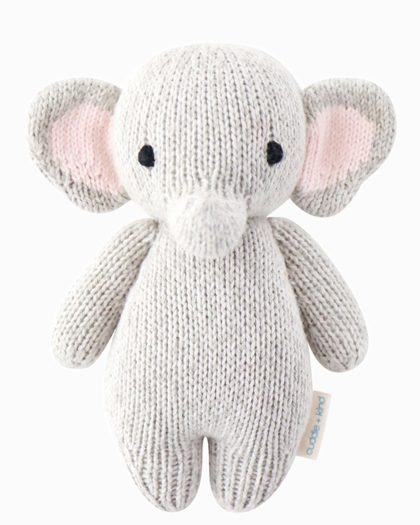 Cuddle + Kind baby elephant plush toy with soft gray fur and large floppy ears, ideal for cuddling and gentle play.