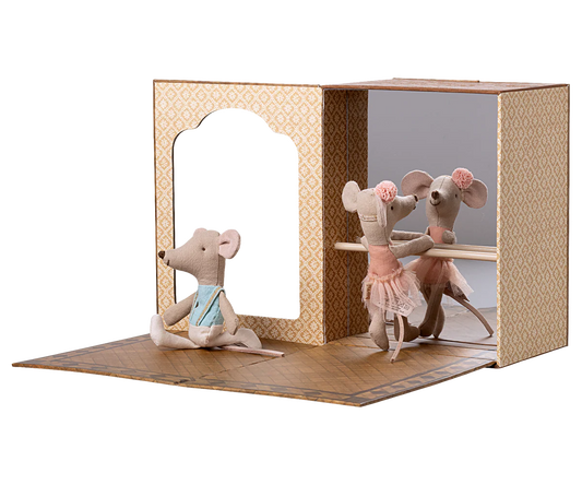 Maileg ballet mice, little sister and brother, in a dance studio setting, dressed in ballet costumes, playful and charming scene.