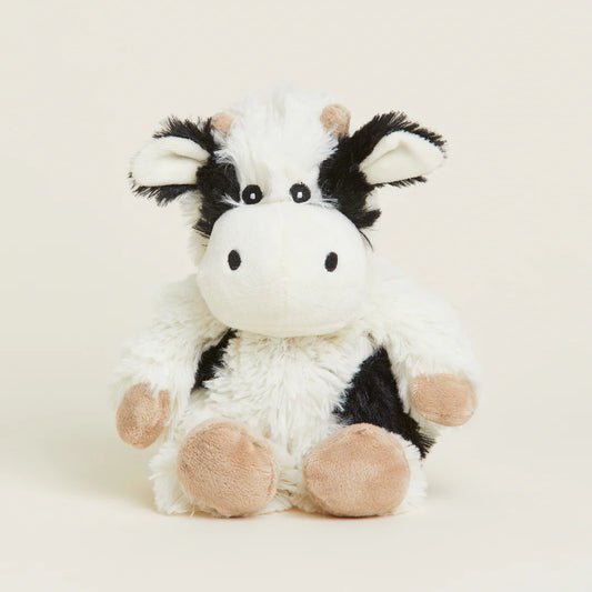 Warmies Black and White Cow Junior plush toy, soft stuffed animal with detailed cow print and friendly appearance.