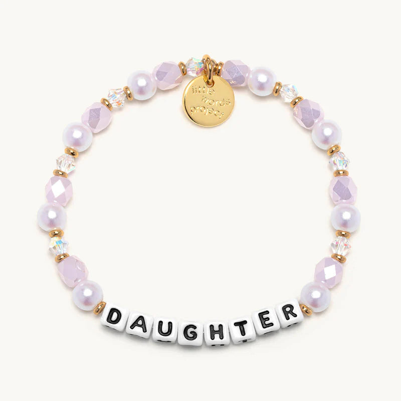 Little Words Project bracelet with engraved message, featuring colorful beads and a delicate clasp, designed for meaningful jewelry.