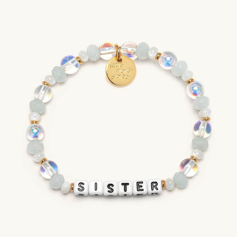 Little Words Project bracelet featuring engraved words on a delicate chain, showcasing a stylish and meaningful jewelry piece.