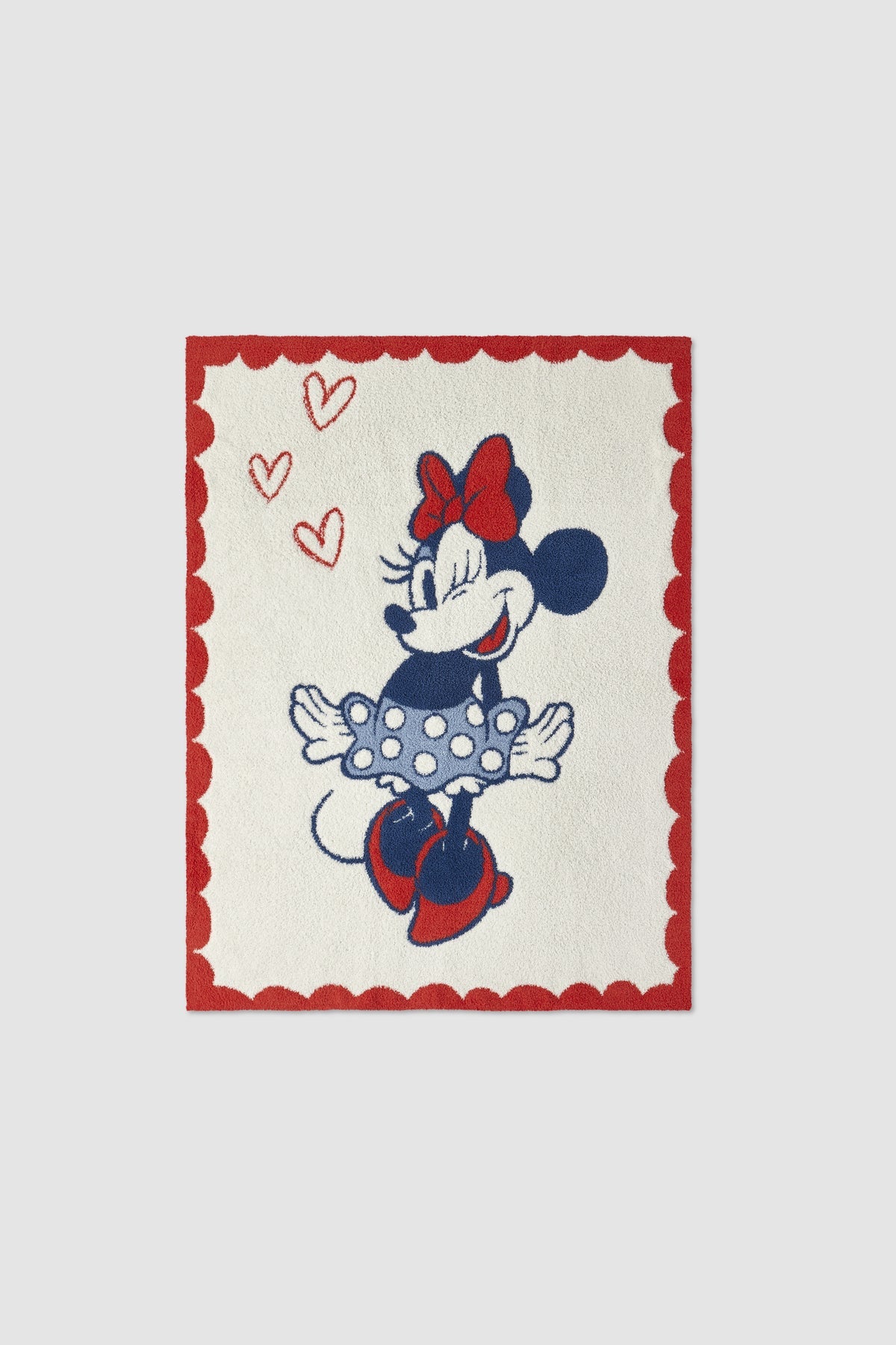 Barefoot Dreams CozyChic Disney Minnie Love stroller blanket in cream with colorful Minnie Mouse design, open to show soft fabric.