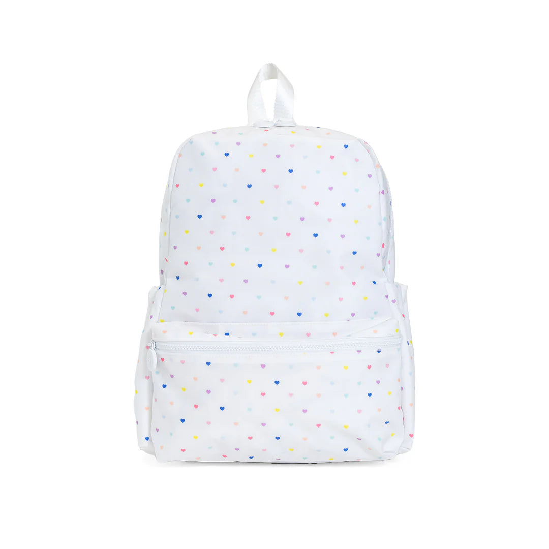 TRVL Designs backpack with multiple compartments, black fabric, and adjustable straps, designed for travel and daily use.