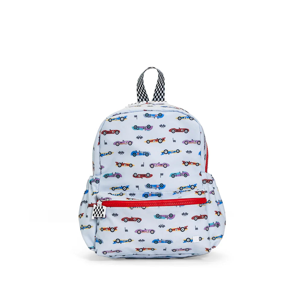 TRVL Designs Mini Backer featuring a compact, stylish design with colorful patterns and a leather strap for everyday carry.