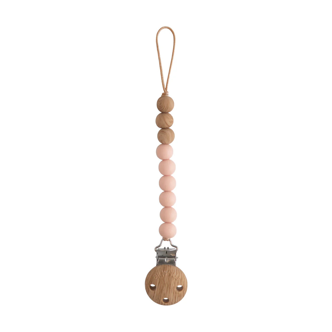 Eva blush silicone pacifier clip by Mushie attached to a baby pacifier, featuring a soft pink strap and durable clip.