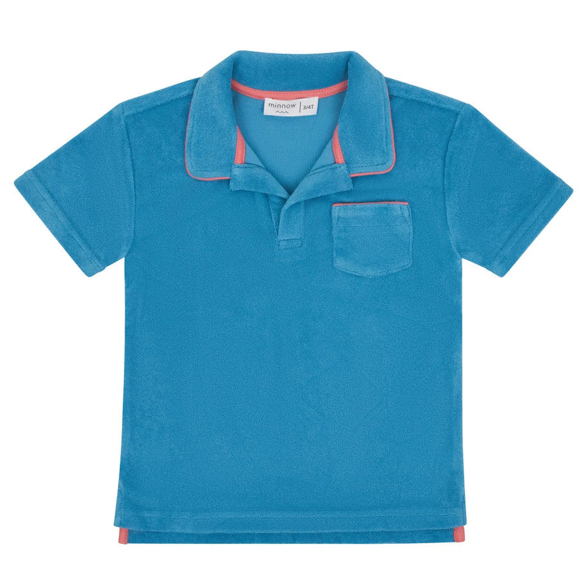 Minnow boys Niagara French terry polo shirt in navy with a classic collar and short sleeves, displayed on a hanger.