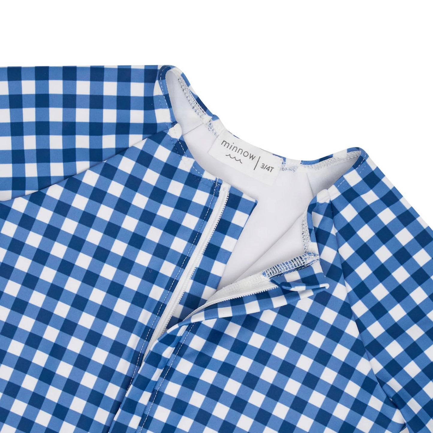 Girls navy gingham front zip rashguard one-piece by Minnow, featuring long sleeves and a comfortable, stylish design.