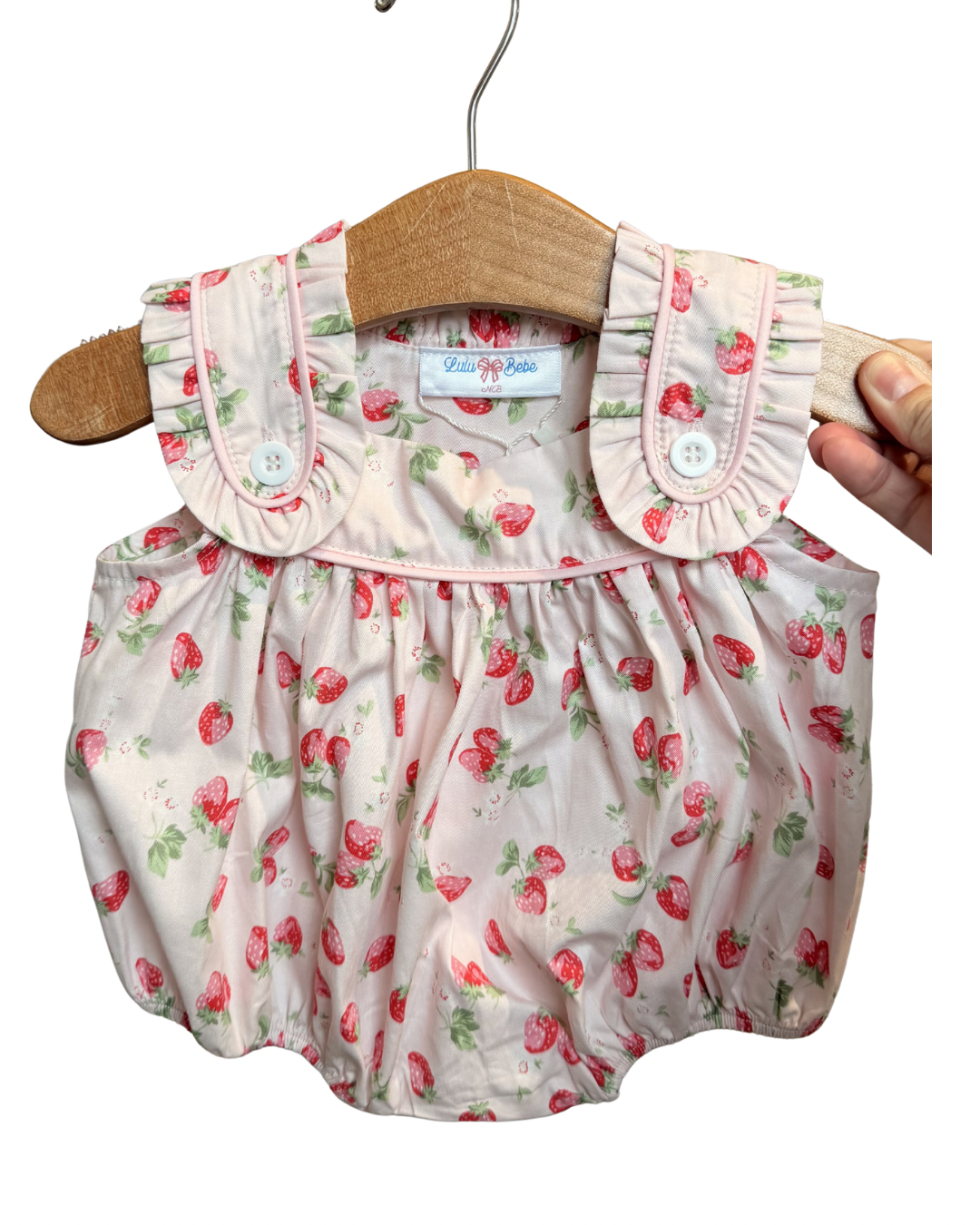 Strawberry sleeveless ruffle bubble dress by Lulu Bebe featuring a playful strawberry print and ruffled details.