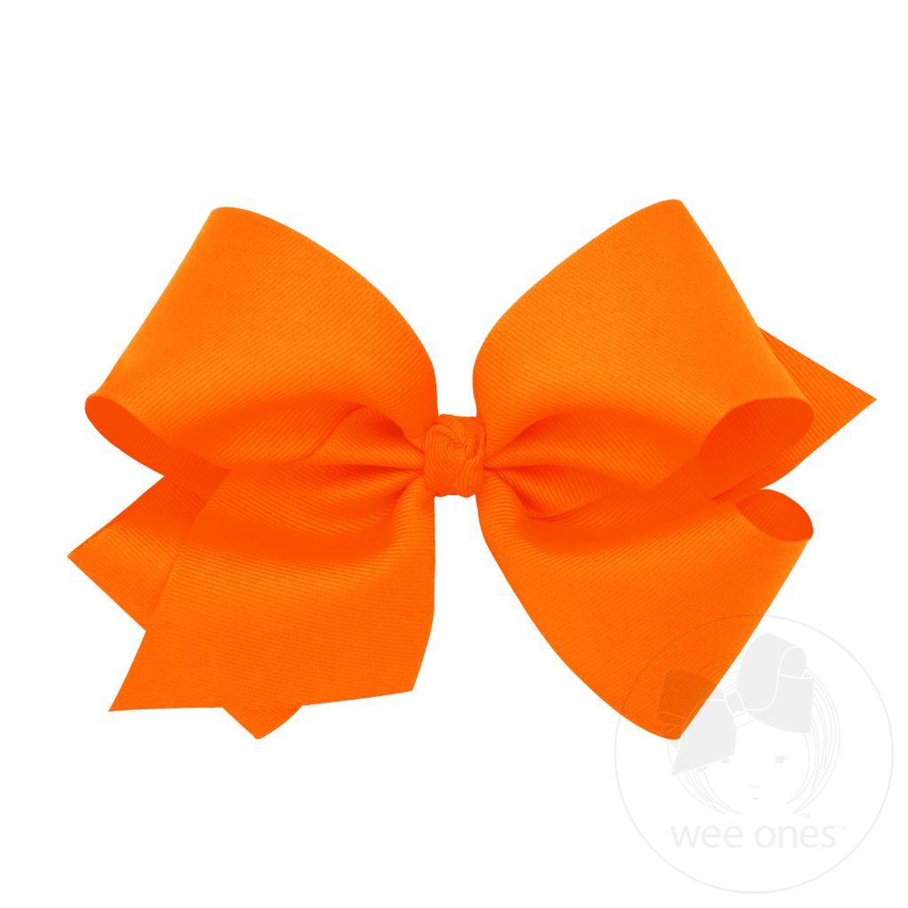 Orange grossgrain hair bow by wee ones with a knot wrap design, perfect for children's hairstyles.