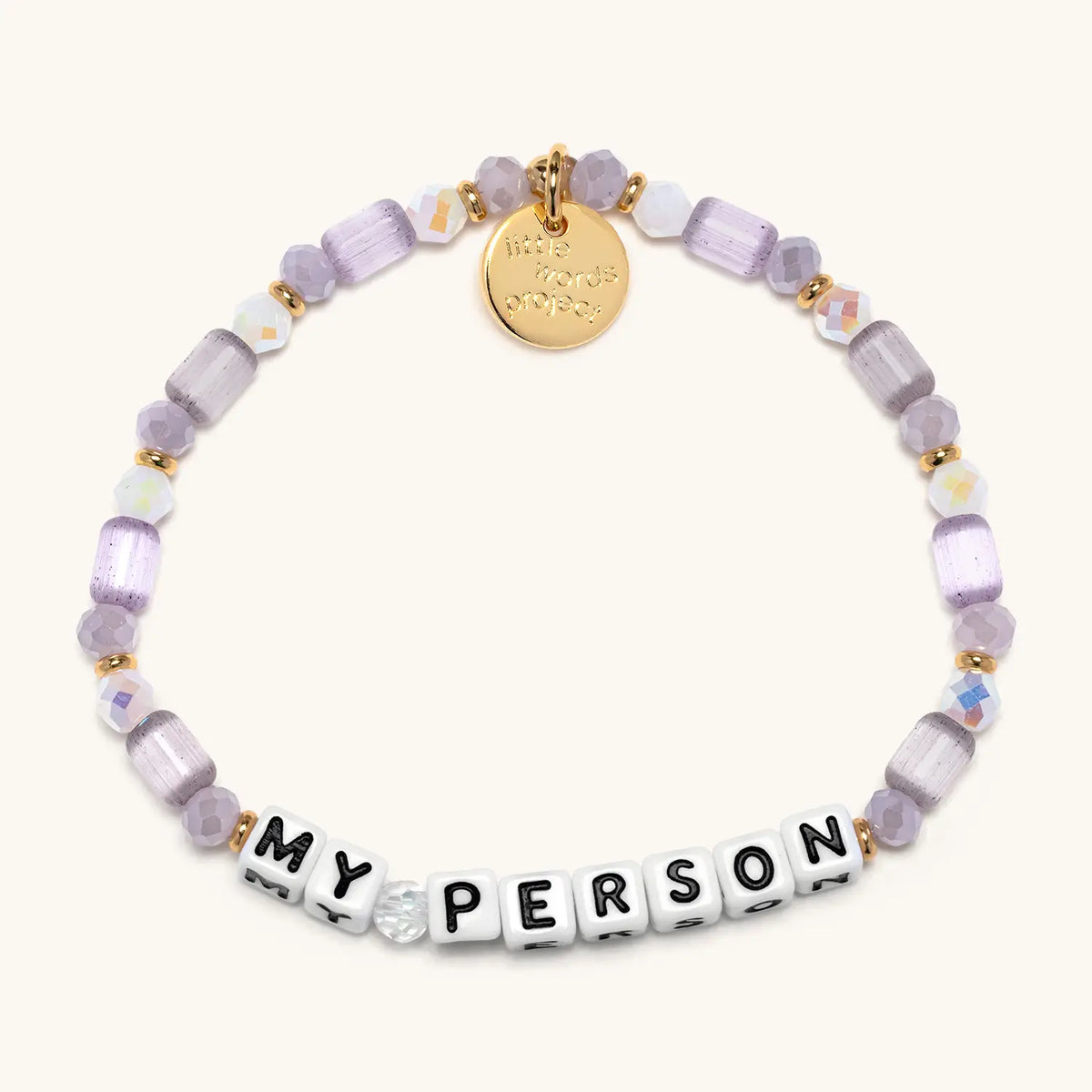 Lavender lace bracelet from Little Words Project with the inscription "My Person," featuring delicate string and charm details.