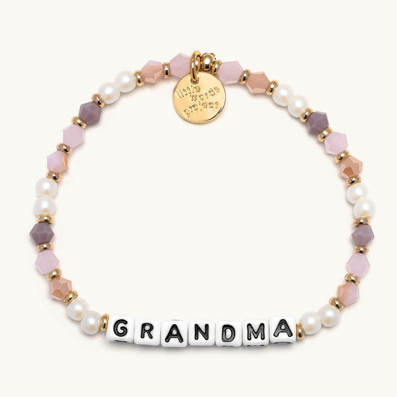Little Words Project bracelet with engraved message, featuring colorful beads and a silver clasp, designed for meaningful jewelry.