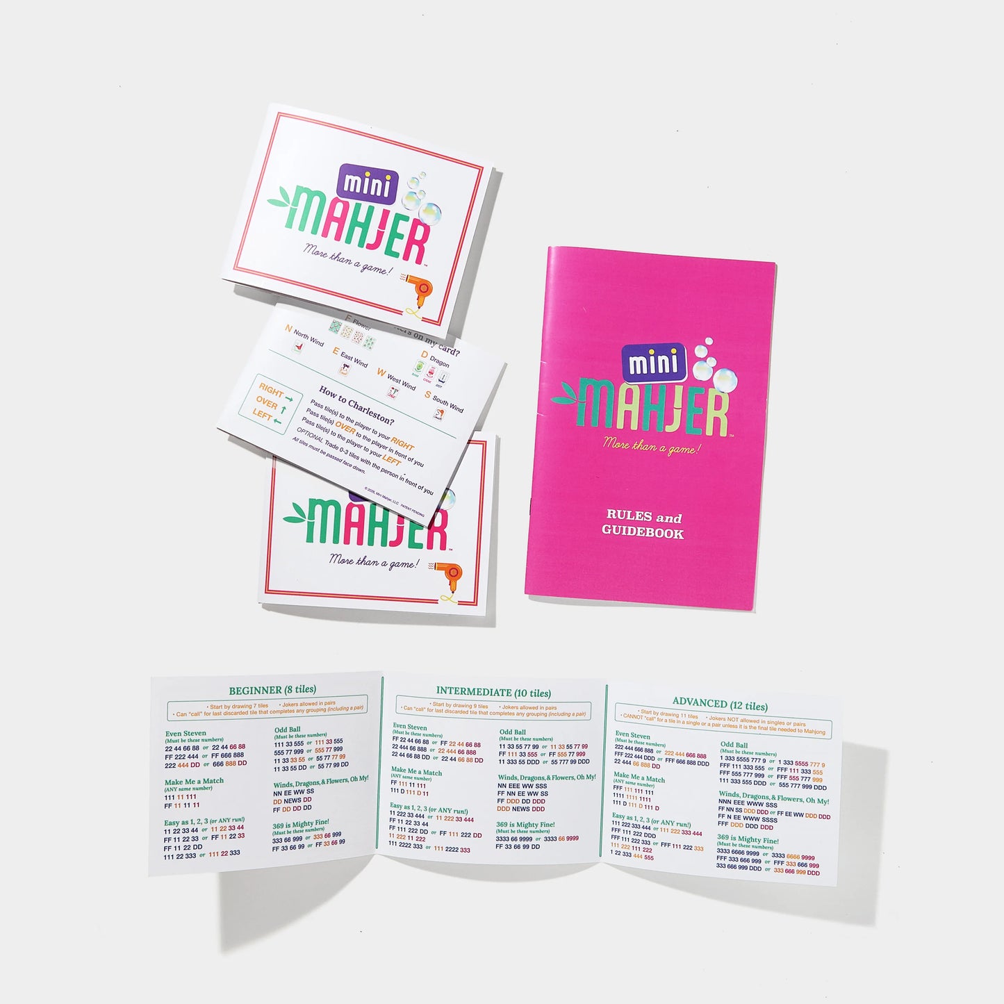Complete Bubbles & Bows Edition game by Mini Mahjer featuring colorful game pieces and vibrant packaging.