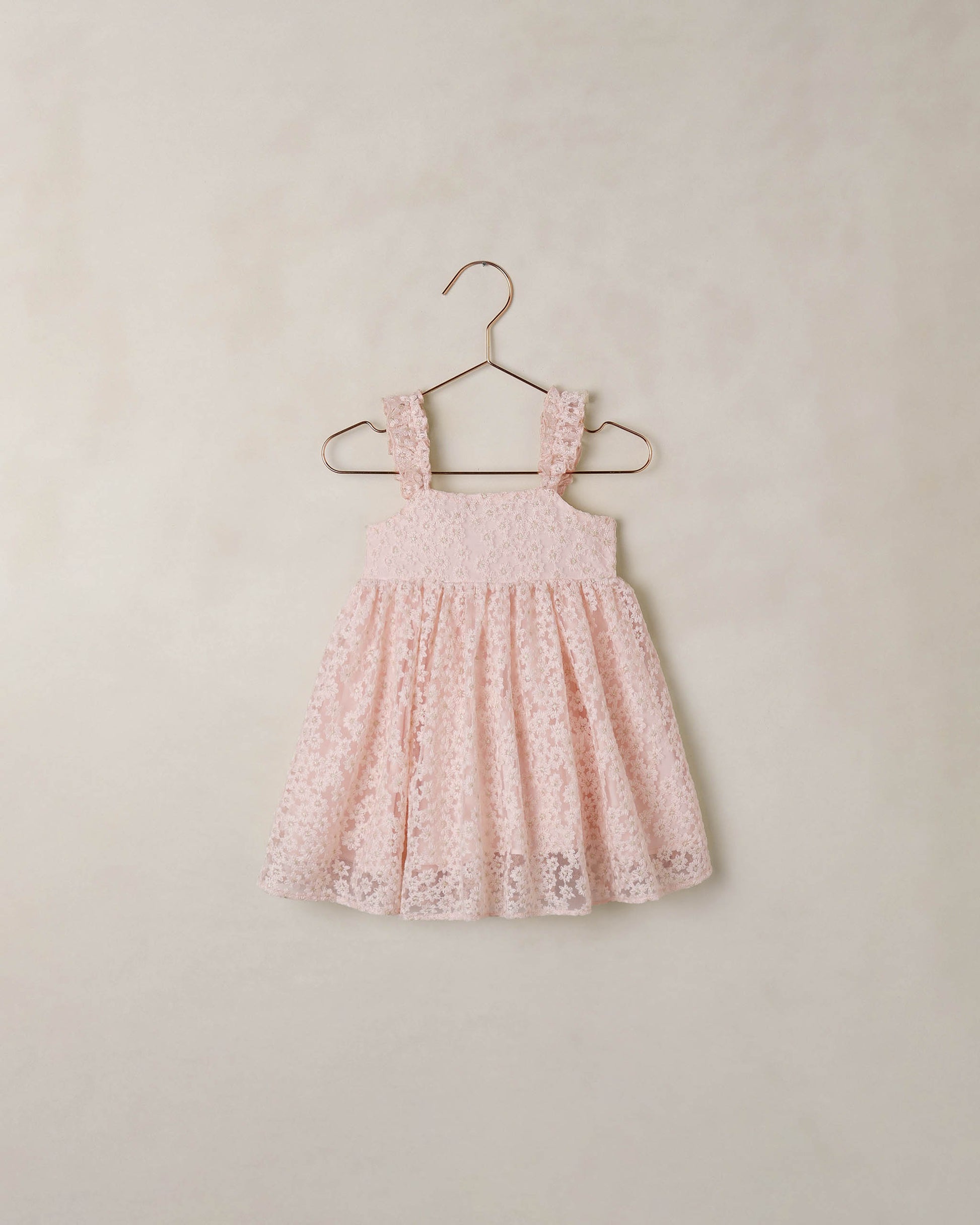 Noralee Cotton Candy Mara Dress in soft pastel pink with flowing fabric and delicate details, perfect for casual or special occasions.