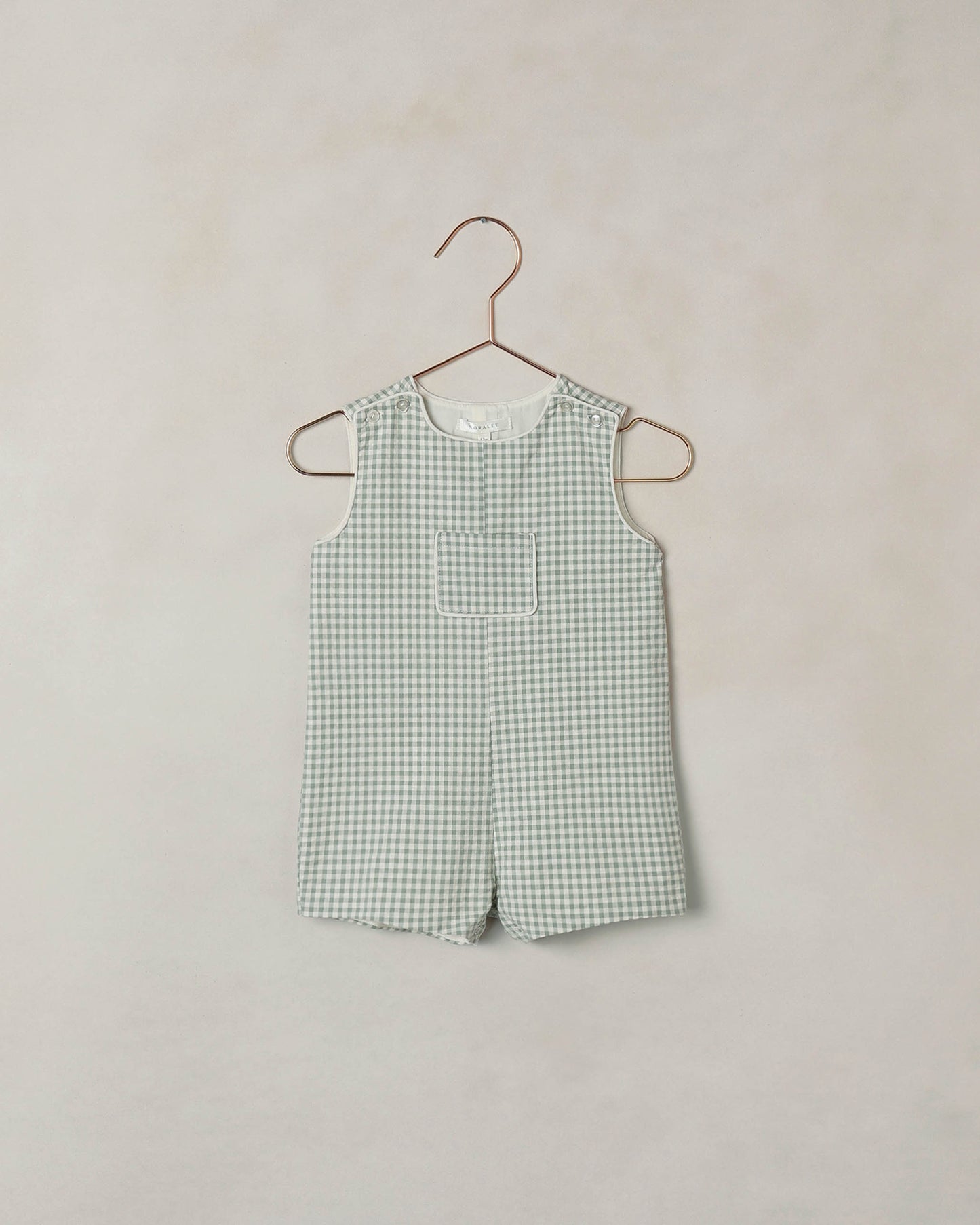 Noralee Eucalyptus Check Georgie Romper, toddler girls' short-sleeve romper with check pattern and button details, front view.