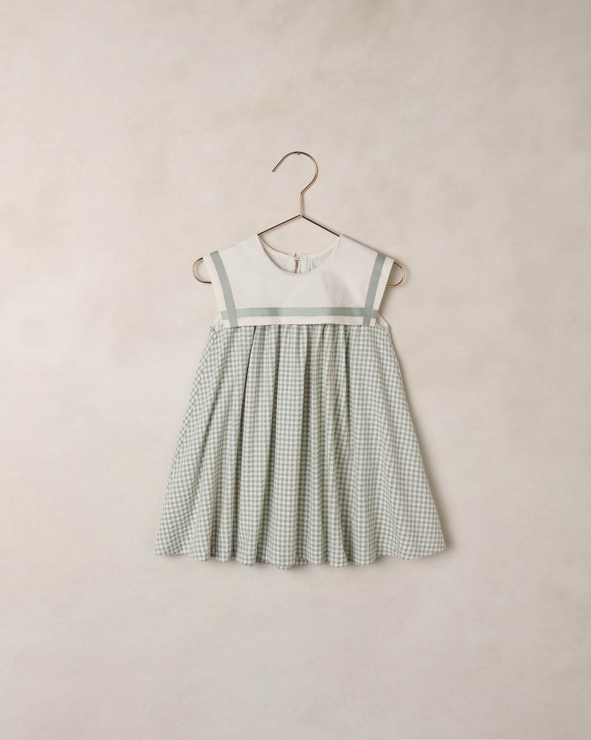 Noralee Eucalyptus Check Daisy Dress featuring a floral pattern, lightweight fabric, and casual summer style.