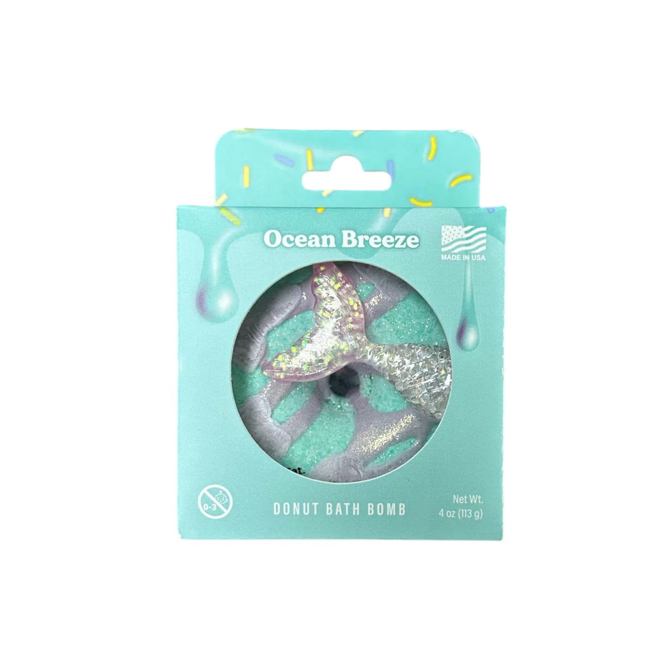 Ocean Breeze Donut Bath Bomb by The Lavish Goat with blue and white swirls, shaped like a donut, designed for relaxing bath experiences.