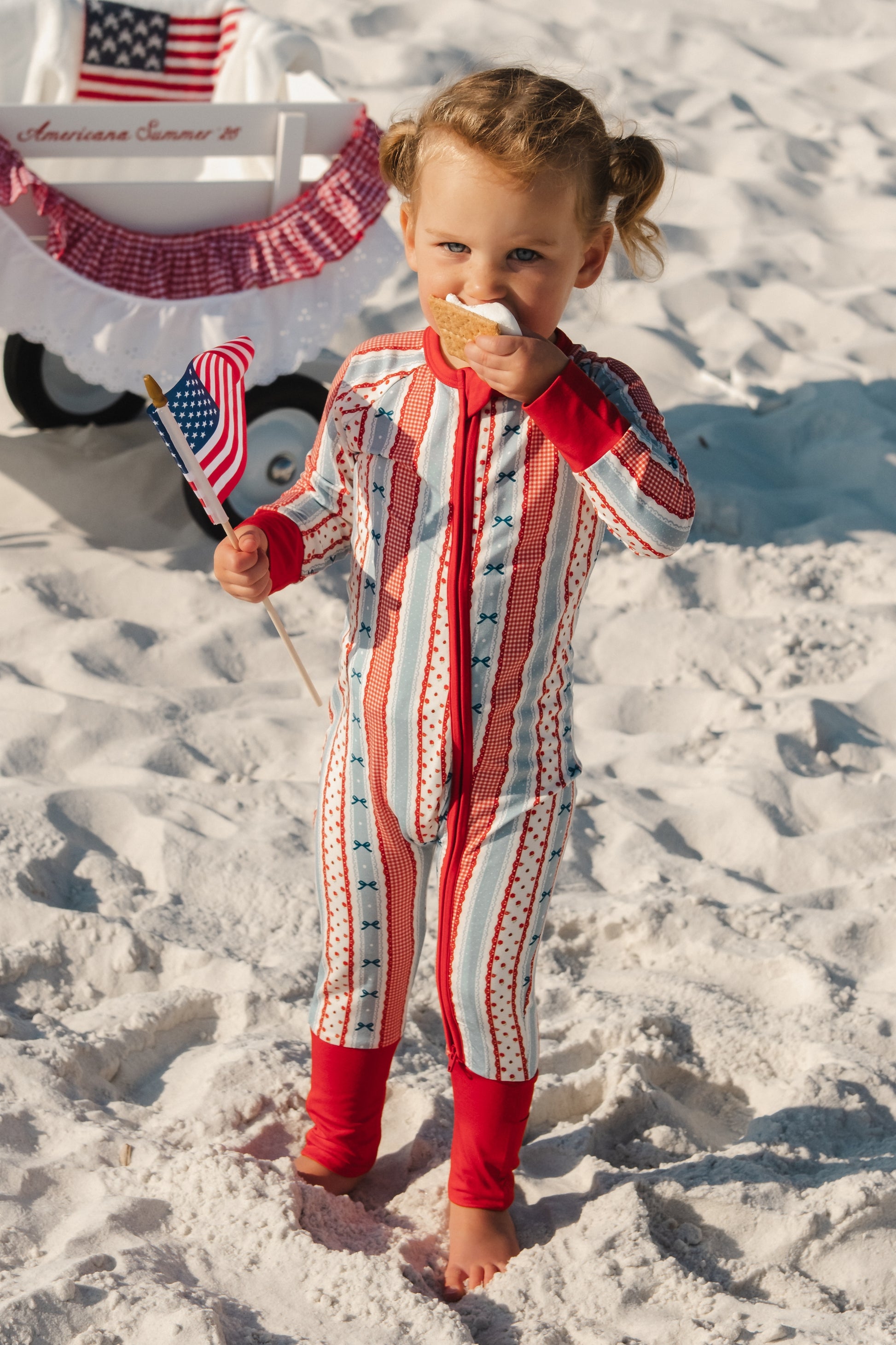 Heritage striped zipper romper by In My Jammers, featuring a colorful striped pattern and front zipper detail.