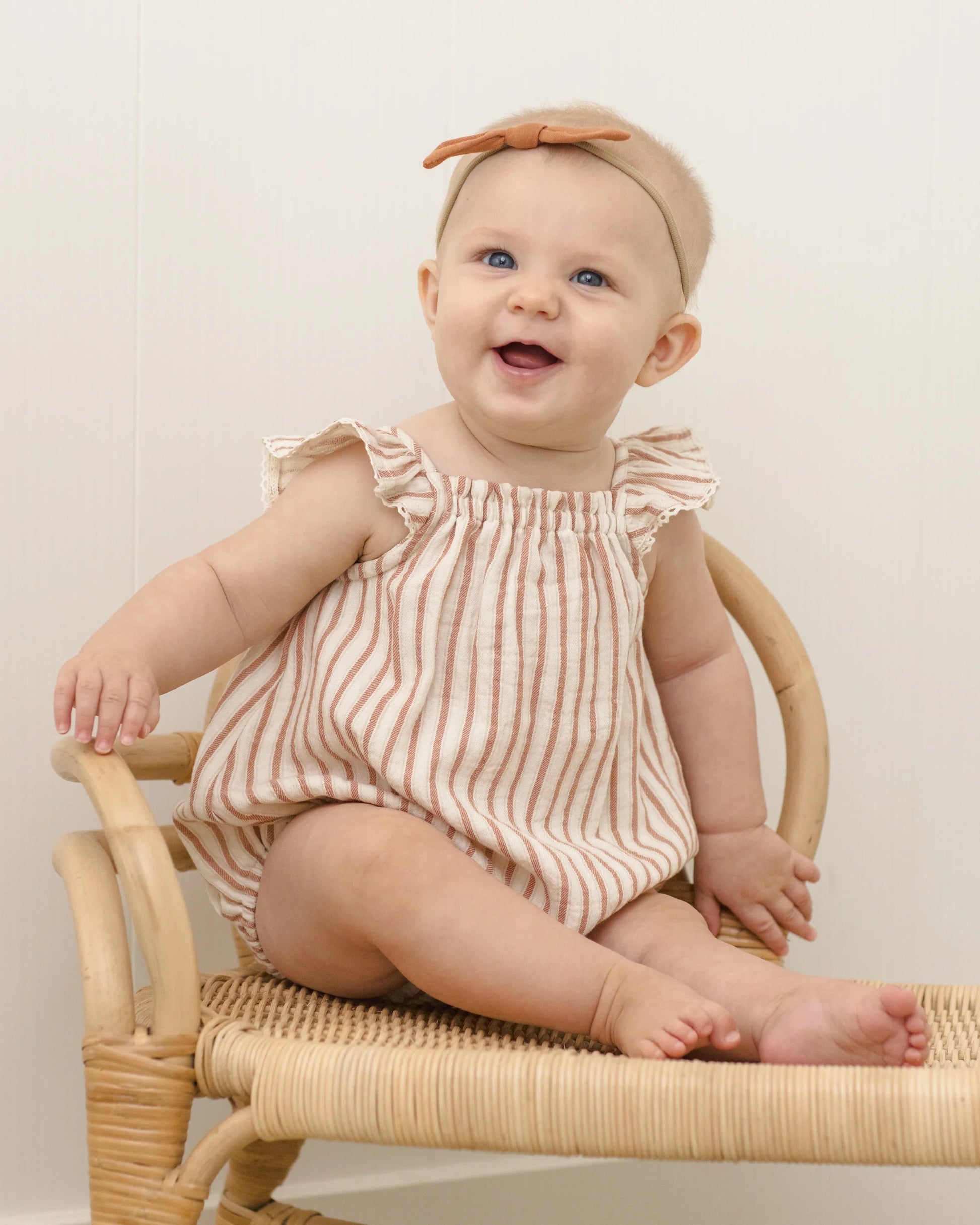 Boy's vintage stripe Bonnie romper by Quincy Mae, featuring colorful striped fabric and comfortable fit for casual wear.