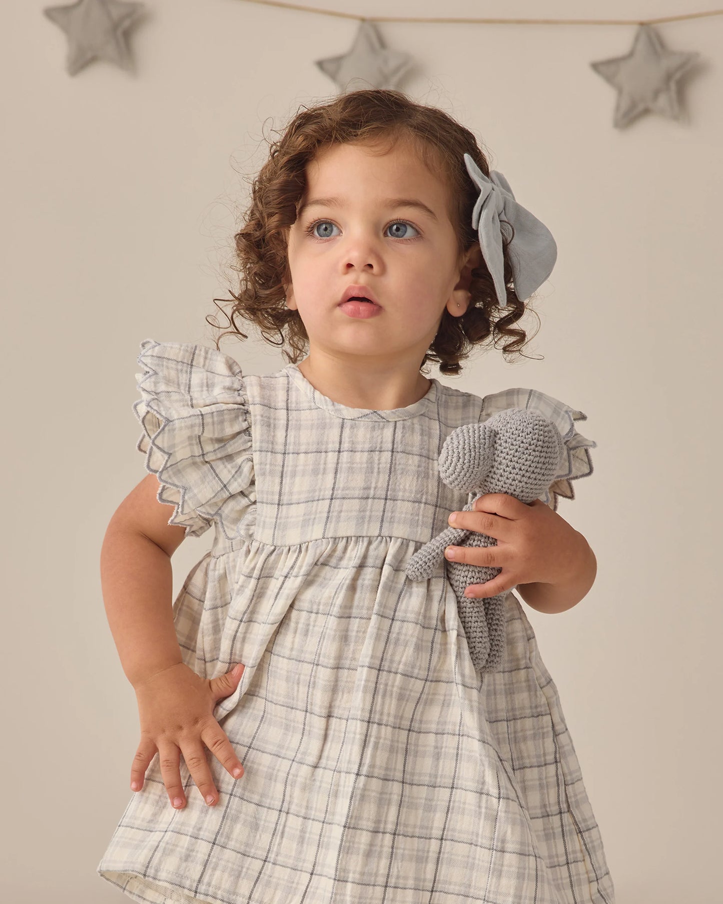 Quincy Mae Sky Bow in soft fabric with a gentle pink and white design, ideal for baby or toddler clothing or accessories.