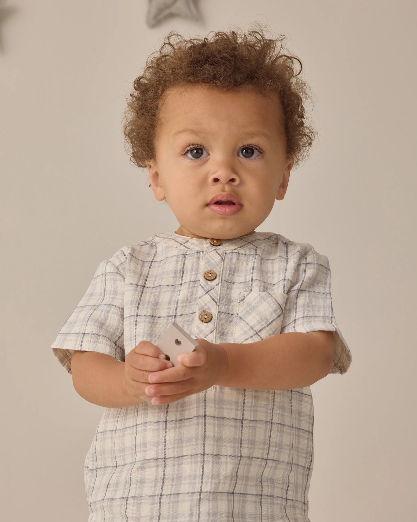 Blue plaid Jaxson shirt by Quincy Mae, shown flat with collar, long sleeves, and button-down front on a white background.